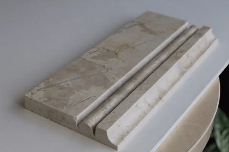 Marble skirting following a staircase
