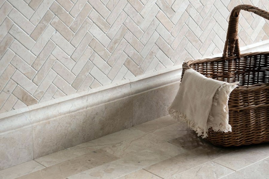 Marble skirting installed along a wall and floor