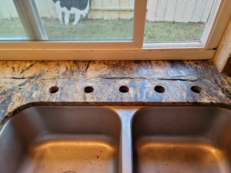 Cracks in granite countertop around kitchen sink